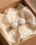 White Opal Silver Stud Earrings in a kraft gift box