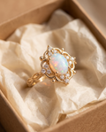 White Opal Baroque Gold Ring in a kraft gift box