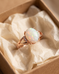 White Opal Rose Gold Ring in a kraft gift box