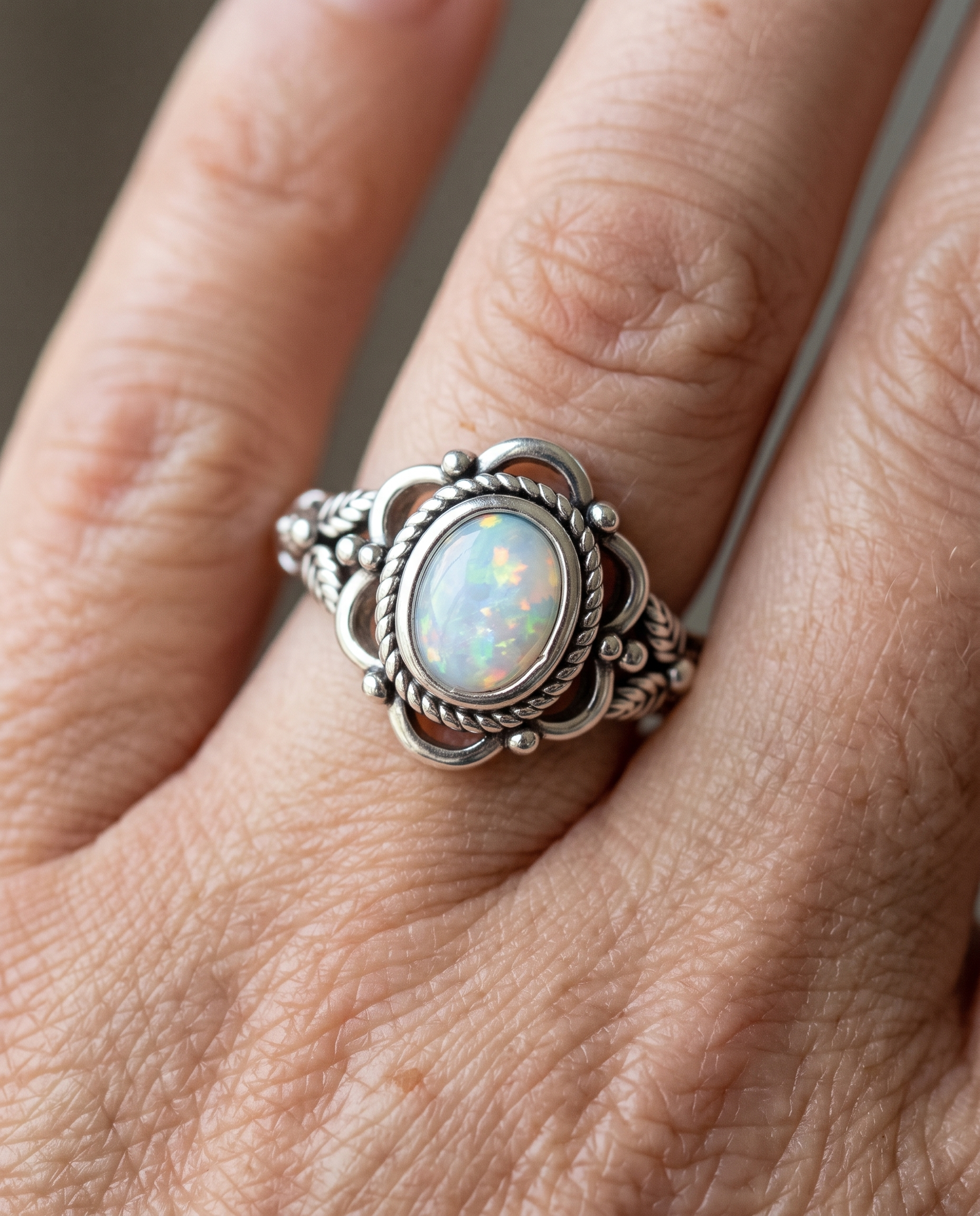Vintage Silver and Opal Floral Ring worn on a model