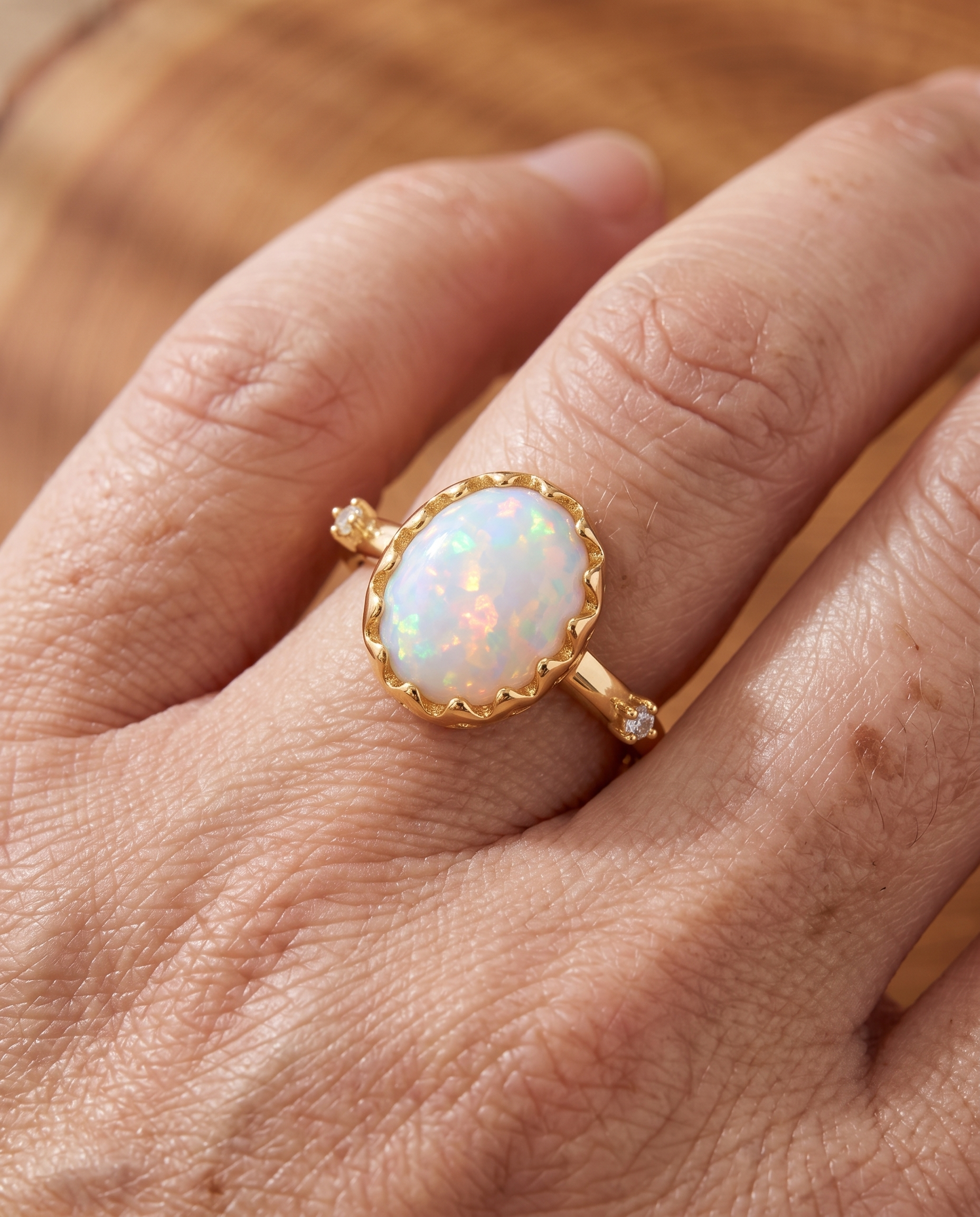 White Opal Dainty Gold Ring worn on a model